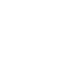 A cross is placed on the top of a tombstone.